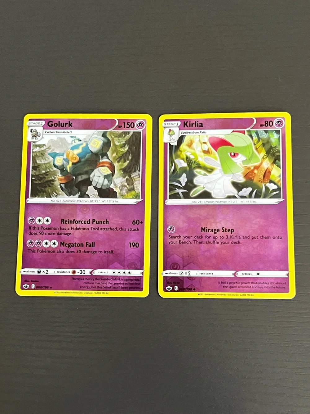 2 Pokémon Cards. Golurk 066/198 HP 150 And Kirlia 060/198 HP 80